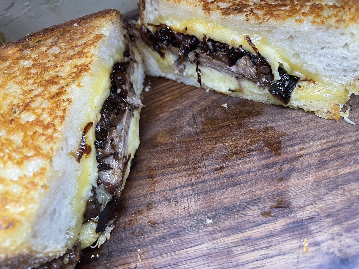 Sdlshaw's tweet photo. Soooo i did an experiment today. Braised short rib grilled cheese on thicc ass sourdough. One was done with my grill press and one wasn’t. Cheeses used in first pic https://t.co/Sgb9PEQK5H