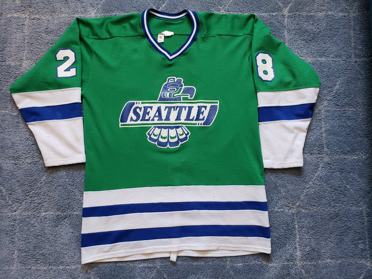 2RogueDubRacks's tweet photo. The Vintage look wins again this week. This 1987-88 @SeattleTbirds road Green was worn by winger Gary Grant. Nice wear on this Cooper mesh beauty. Gary was one of the toughest players to ever lace them up for the 'Birds.This team didn't win much in 88,but they were fun to watch. https://t.co/ejglzL0PRu