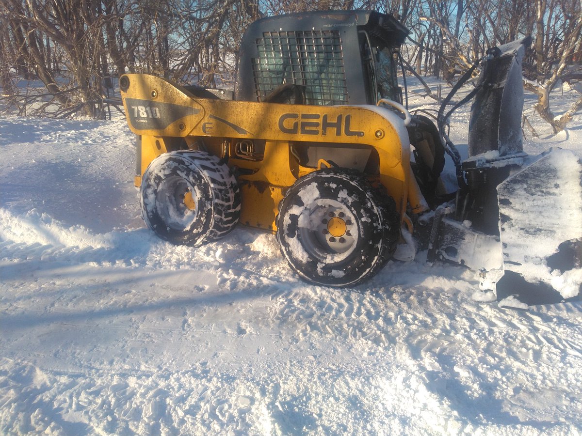 Skid loaders pretty helpless when the blowers on the front and you fall off the hard pack