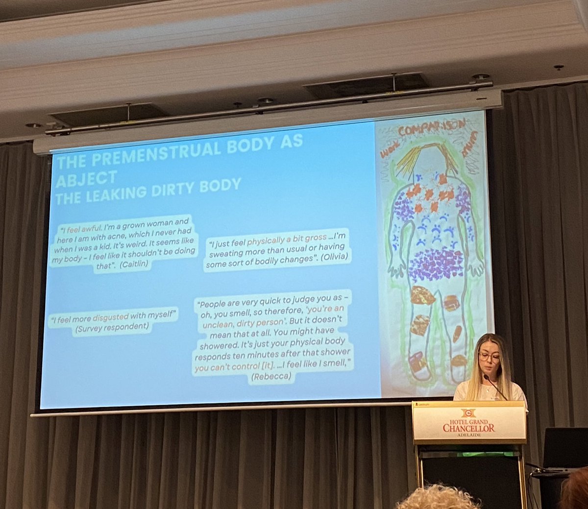 <a href="/SamanthaLRyan95/">Samantha Ryan</a> presenting her work on premenstrual body dissatisfaction - women see their bodies as dirty and leaking, and self-police to reduce dissatisfaction. Challenging these negative discourses helps to reduce dissatisfaction! 🩸 <a href="/ASPOGau/">ASPOG</a>