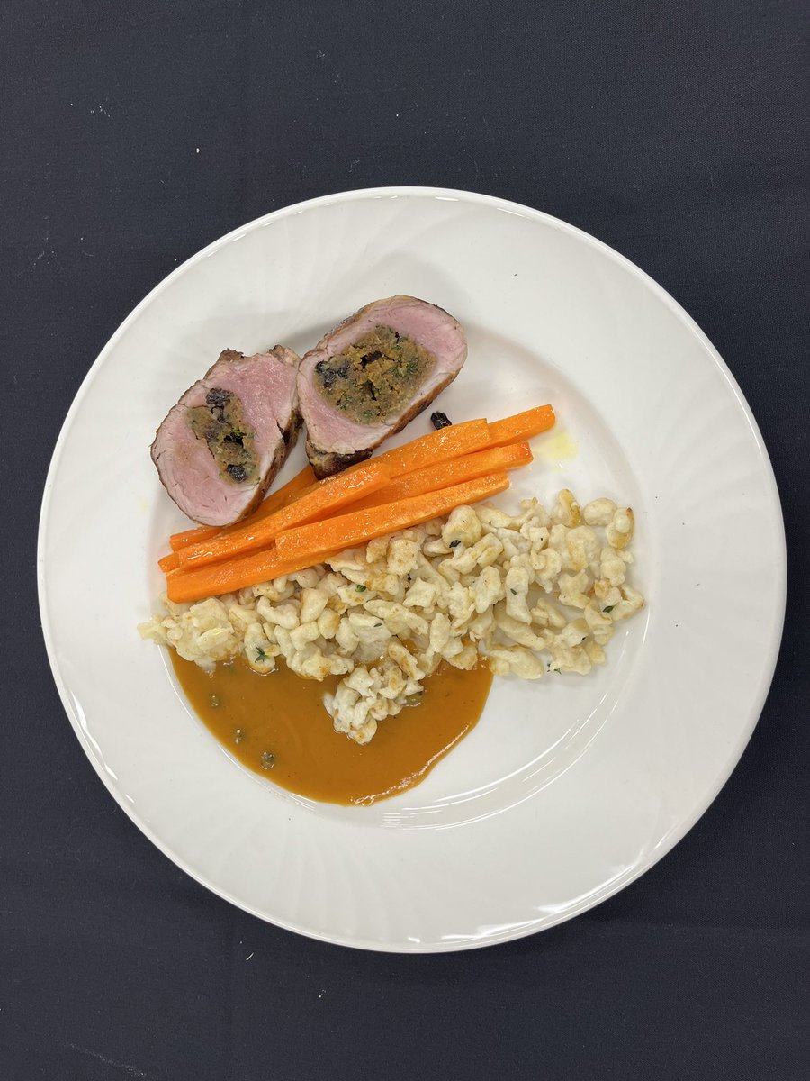 HSCCYeg's tweet photo. The main courses have been served! From teams 9, 10, 11 &amp; 12 we bring you stuffed pork tenderloin, spaetzle, and glazed carrots batonnet. #hsccyeg #culinaryart https://t.co/eATZjPEM2E