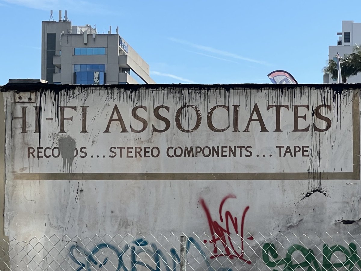 stevewright64's tweet photo. Building demolition on Miami’s Coral Way reveals long-hidden advertisement for Hi-Fi Associates: Records…stereo components…tapes. Wonder what era this place was open? Maybe The Rolling Stones were on their 30s. #streetphotography #oldmiami #hifi #records #coralway #history #FL https://t.co/jZpdFBS5Ky