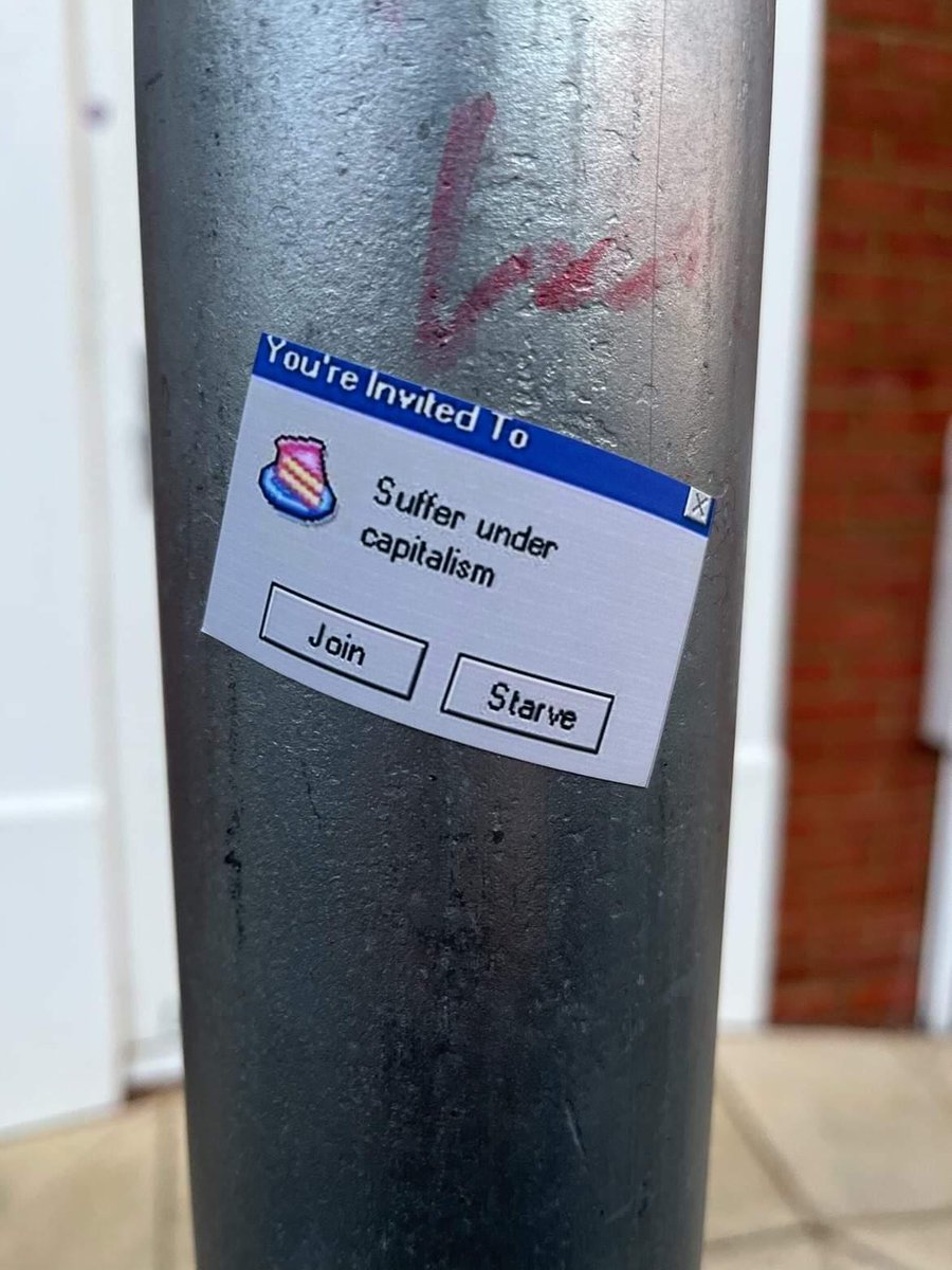 GraffitiRadical's tweet photo. Anti-capitalist sticker spotted in Northampton, UK https://t.co/1yZYWPe2Os
