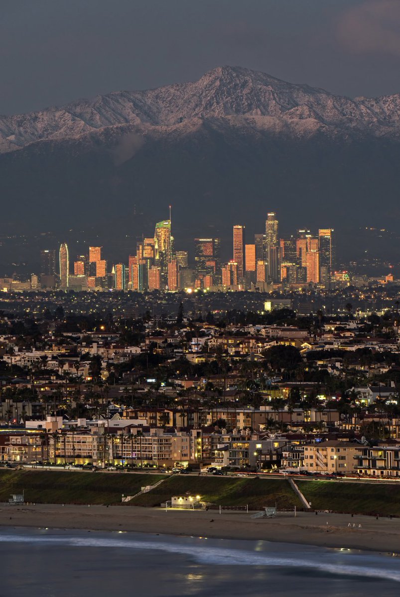 Where else can you catch the surf and snow all in a day