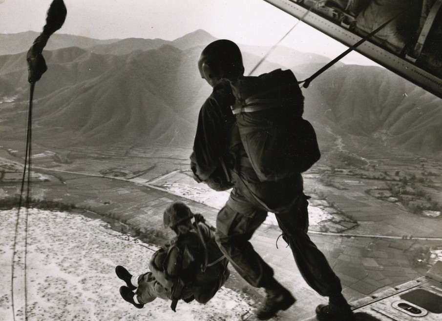 'Jump training for 1st Force Recon Co. & and 1st Recon Bn at Red Beach near DaNang, 1967.  Snipers would fire at the jumpers on the way down, so we jumped from CH-46 helicopters at 1350 feet to give them a more fleeting target.'  

--Capt. Vogel

Fuckin hardcore.

[USMC Archives]