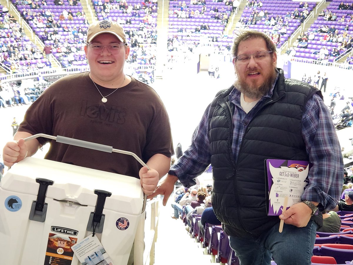 How cool. My son was invited by @WeberStateU to come to a basketball game for being accepted to the school. And he ended up winning a cooler. How cool. Thank you Weber St. It was really fun. @WeberStateMBB