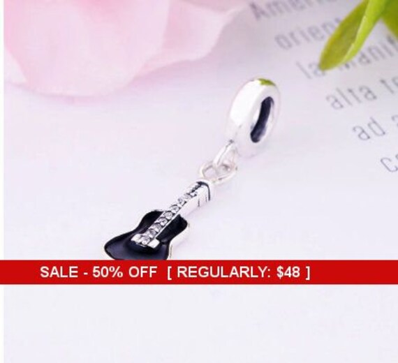 Jennife57232043's tweet image. Sterling Silver Guitar Charm, Music Charm, Guitar etsy.me/3bFMqhN #sterlingsilver #pandoracharm #guitarcharm #musiccharm @etsymktgtool