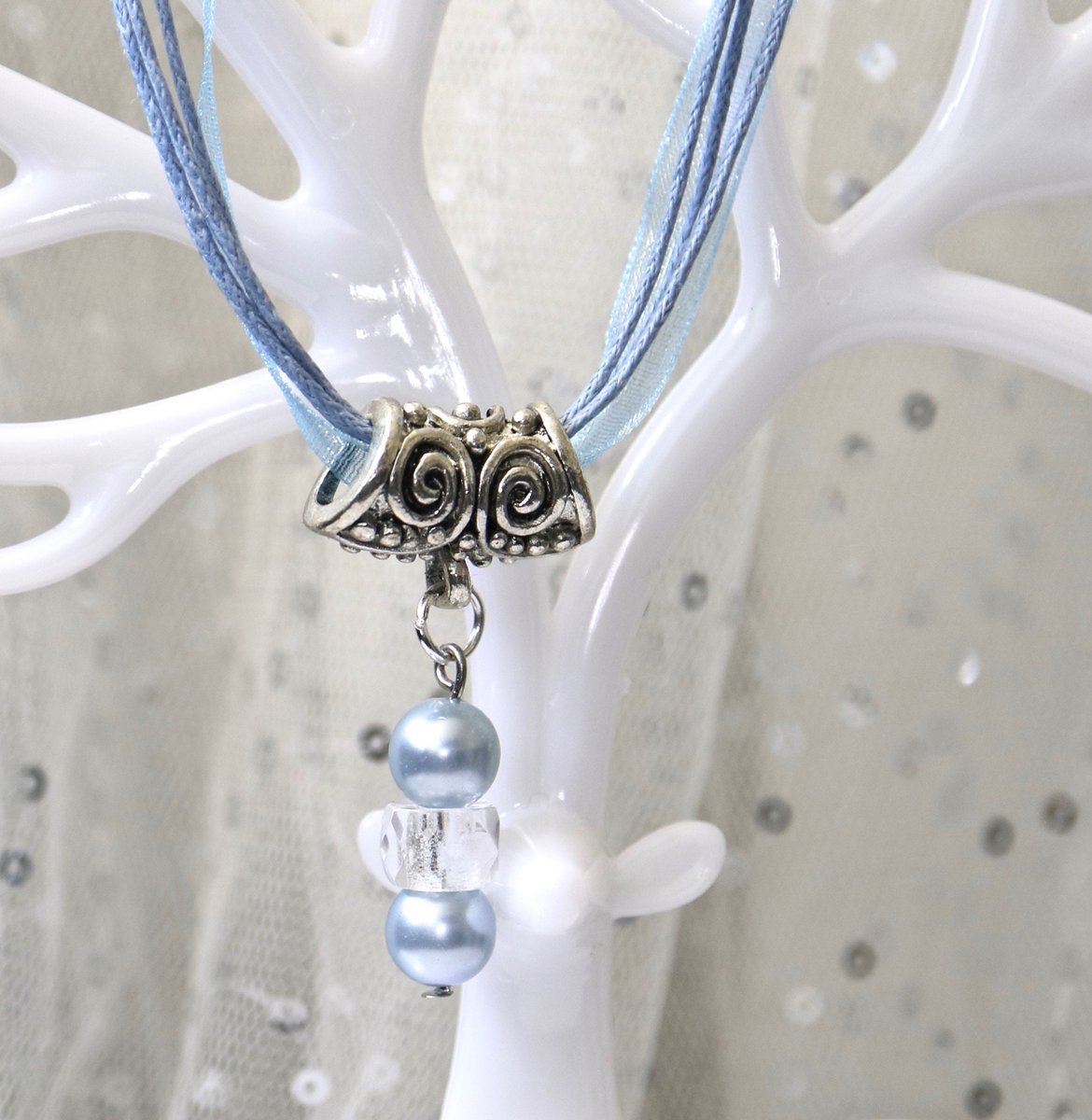 AdlibDesigns's tweet photo. I put these elements together to create a pendant in powder blue pearl and crystal, on a large patterned silver bail, strung on a matching ribbon and cord necklace. https://t.co/UPIKhvjzlS #shopindie #ukgifthour #ukgiftam #mothersday #freepandp https://t.co/Mri9vrc0Pf