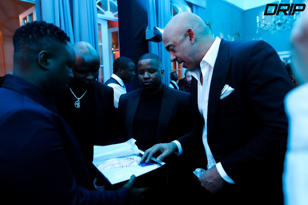 LekauSehoana's tweet photo. The CEO of the Grammy’s Mr Harvey Mason said to me, oh so you’re the owner of DRIP? I’ve seen your billboards all over. At that point i was doing a handover to him.

You must always know where you want to go, and make sure that the right people know about it. 

#GrammyWinnersGala https://t.co/jdOlIKHERH