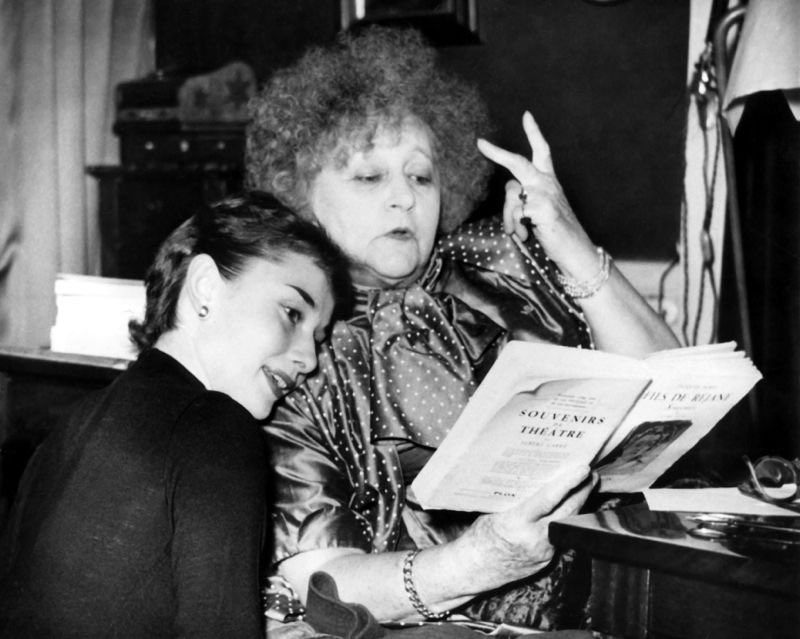 Colette reading to Audrey Hepburn