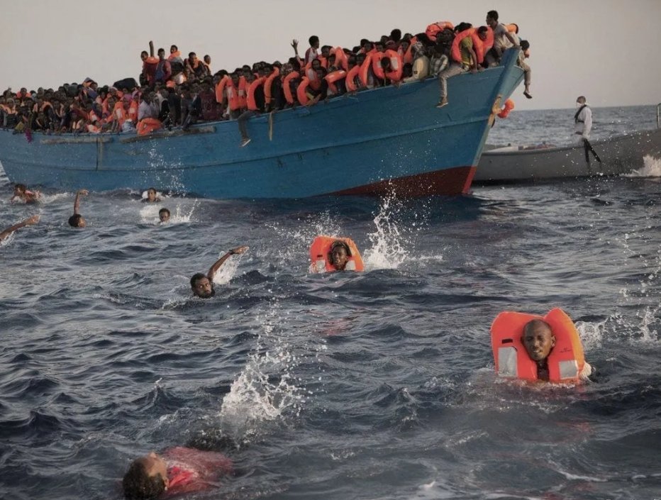 PREACHEROO7's tweet photo. #DefendWindrush
#blacklivesmatteruk #EqualRights #socialism #BoatPeople
People drowning in an effort to better them selves are described as migrants. Those who make it to shore are described as illegal immigrants, handcuffed &amp; detained as criminals. Is that a civilised mindset? https://t.co/RcT8c4VI6W