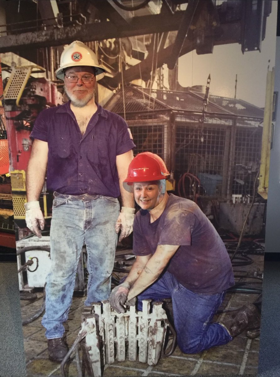 Hubby and me. Hard at work at the oil rig. You should look closely and tell we just popped out heads in cut outs. Galveston 2015.