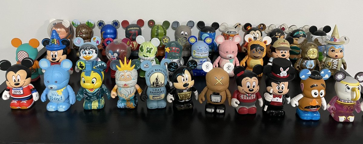 I forgot how fun Vinylmations are! It was fun unpacking to display them in my new little home library! 😀