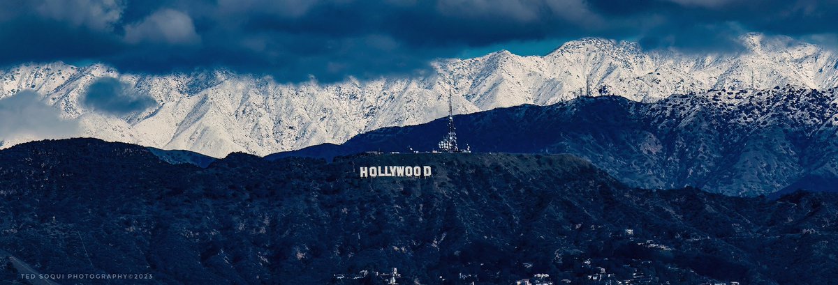 The Hollywood Sign with the snow covered San Gabriel Mountain range in the background. #hollywood #hollywoodsign #snow #rain #lasnow #larain 🎬🌟❄️