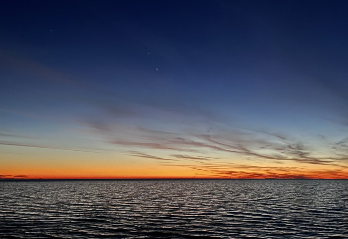 Jupiter and Venus tonight just after sunset over Lake Michigan