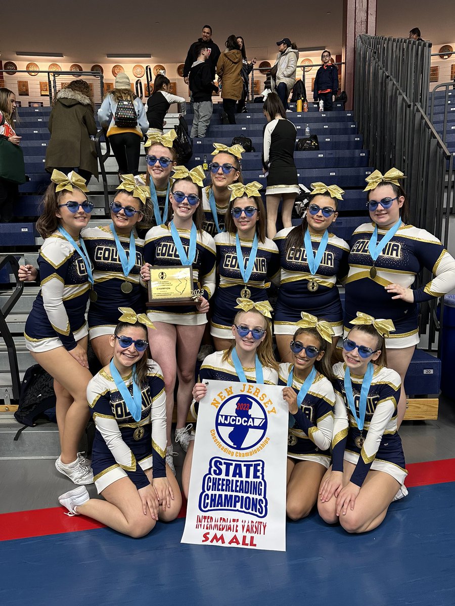 coloniahscheer's tweet photo. State Champs has a nice 💍 to it! What an incredible season it has been with these 12 ladies. Their positive energy and dedication truly showed as they hit a beautiful routine on that mat yesterday. This win was well deserved, we are beyond proud of you! 💙🏆@ColoniaHigh https://t.co/6MRCib9FL7