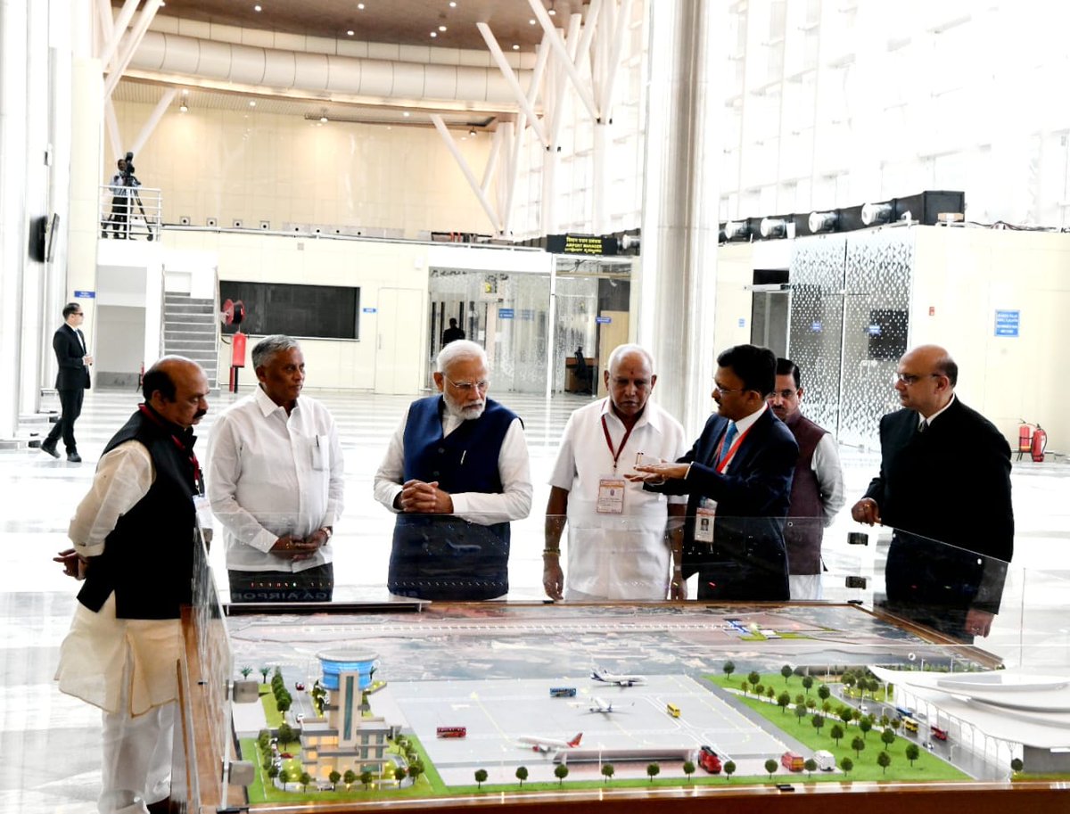 swaraj76's tweet photo. Students haill @narendramodi as @PMOIndia inaugurates #ShivamoggaAirport and presents a plough to #Raitha nayaka @BSYBJP https://t.co/4BE1jckmuH