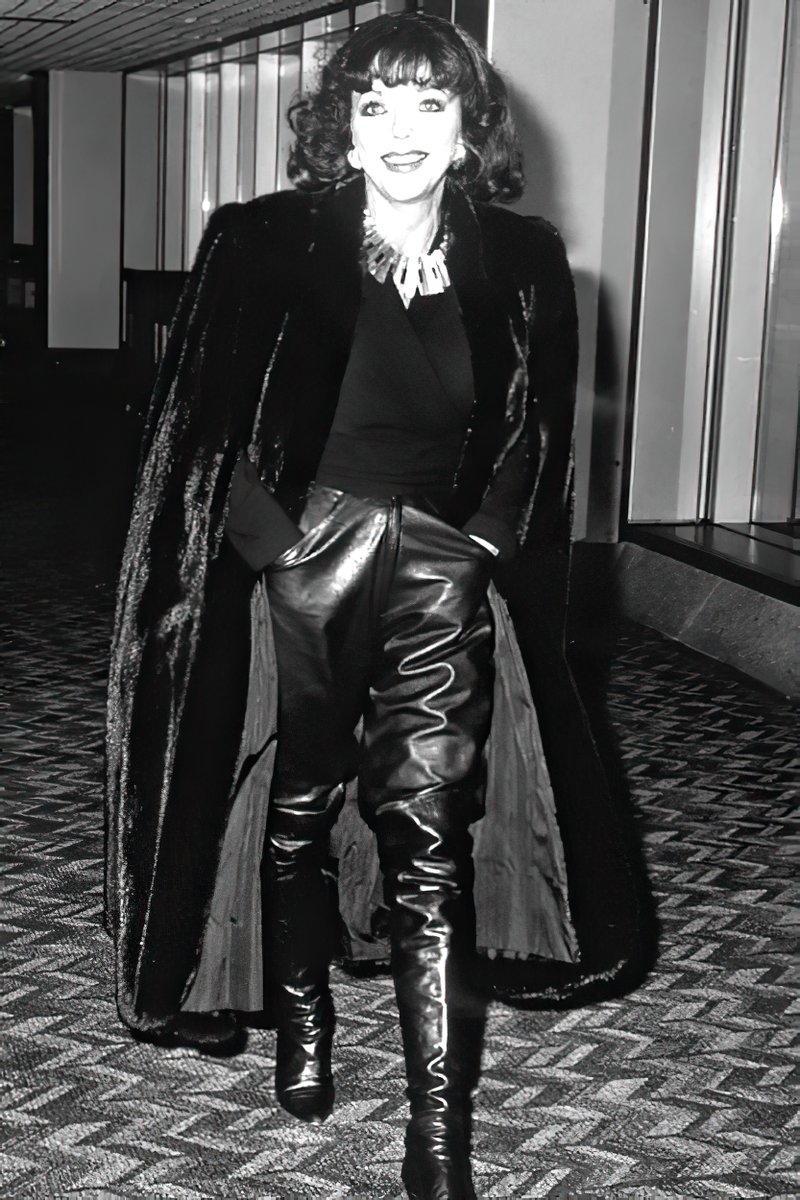 ForcedfemmeM Joan Collins in leather and fur.
