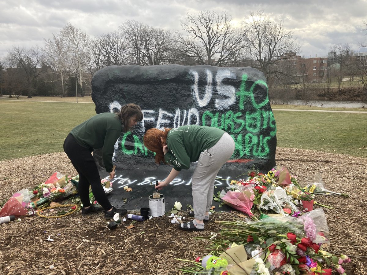 “Come here girl, let’s cover this shit up.”

Two students have arrived with paint to cover over the message on The Rock that advocates for more guns on MSU’s campus. They don’t know each other - but both had the same idea. They’re getting to know each other as they paint.