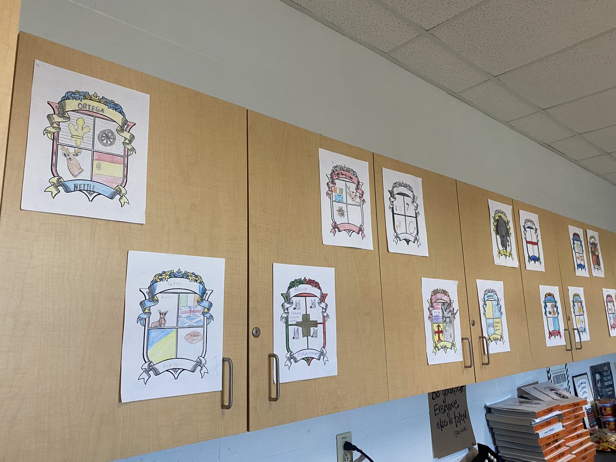 emmabelle_'s tweet photo. Coat of Arms hanging for Brit Lit’s 1st unit: Forging a Hero! Students researched their family name and picked symbols to represent their families! So fun! #heroesgonnabeheroes #britlitislit @italianaaimee22 https://t.co/8O4NXEPkeb
