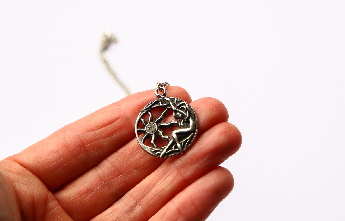 GemstoneMagick's tweet photo. Brigit's Sun Charm Pendant on chain. 
https://t.co/RcvsGq2EQD     
#Brigit #Goddess #Celtic #pagan #Jewelry #charms #pendant #CelticCharm https://t.co/bP1O0cz86v