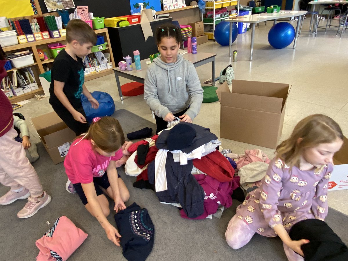 jen_cormier's tweet photo. Time for the ECO club to count the sweaters that JTT donated on National Sweater Day. Thanks everyone! https://t.co/kKzjzafrDr