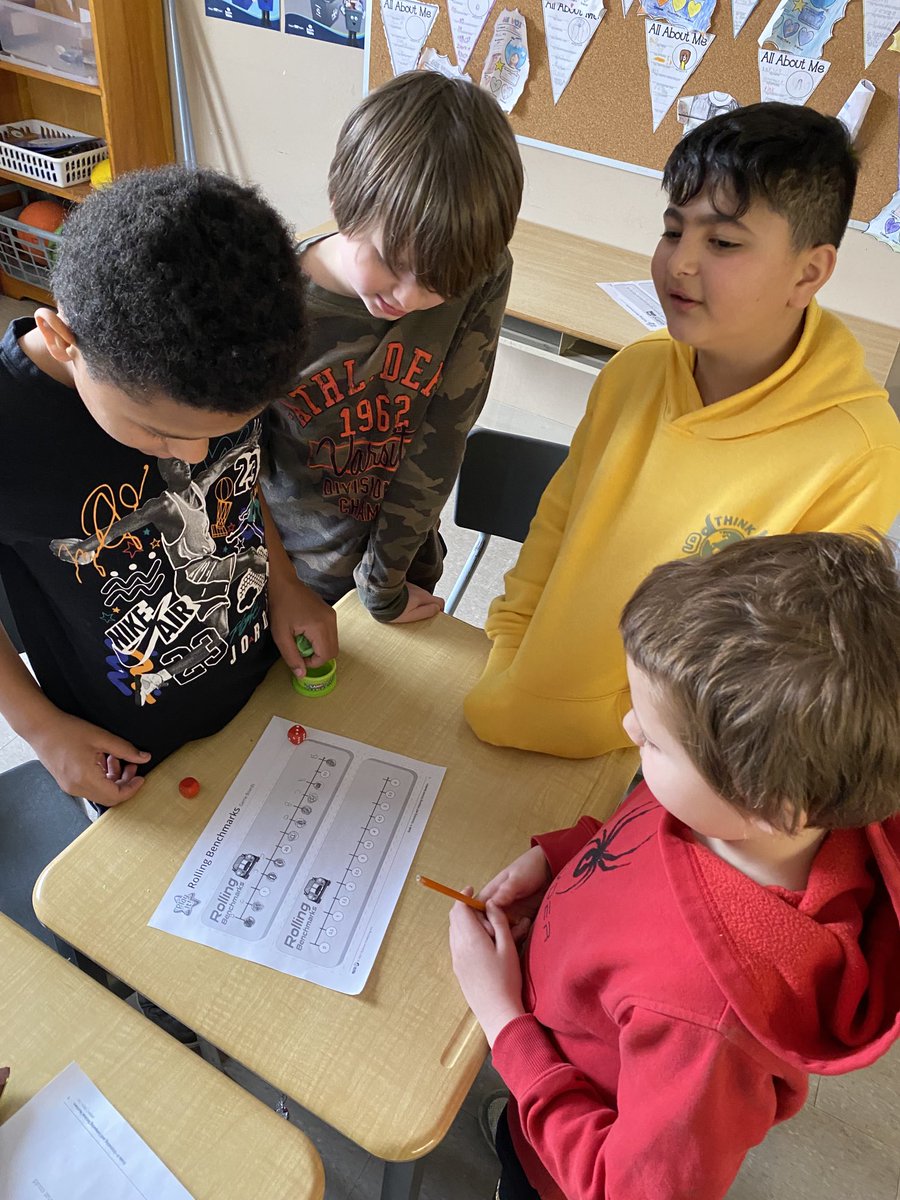 GRivett99's tweet photo. 4/5’s playing a fun game about decimals using dice this morning!! Great work Jaguars! ⁦@EIMJaguars⁩ #mathup https://t.co/p7HHlx1dD0
