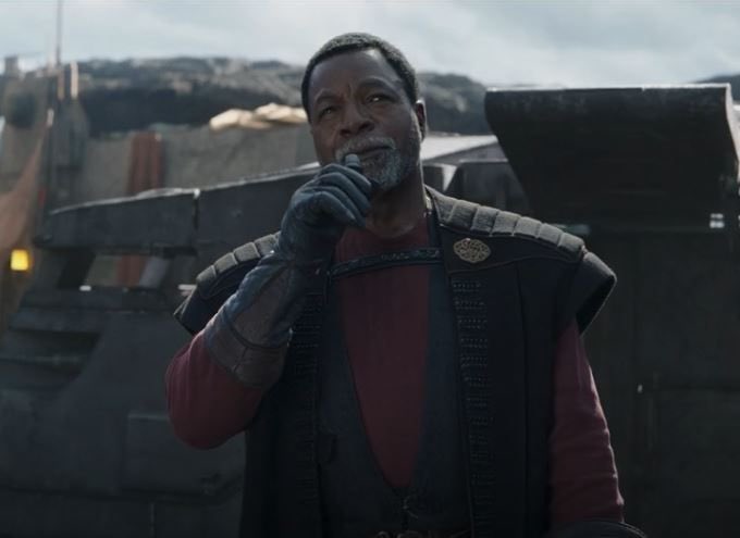 JordanMaison's tweet photo. Truly, the real story of #TheMandalorian is how Greef Karga gets progressively better dressed in each season. https://t.co/pok776RdRE