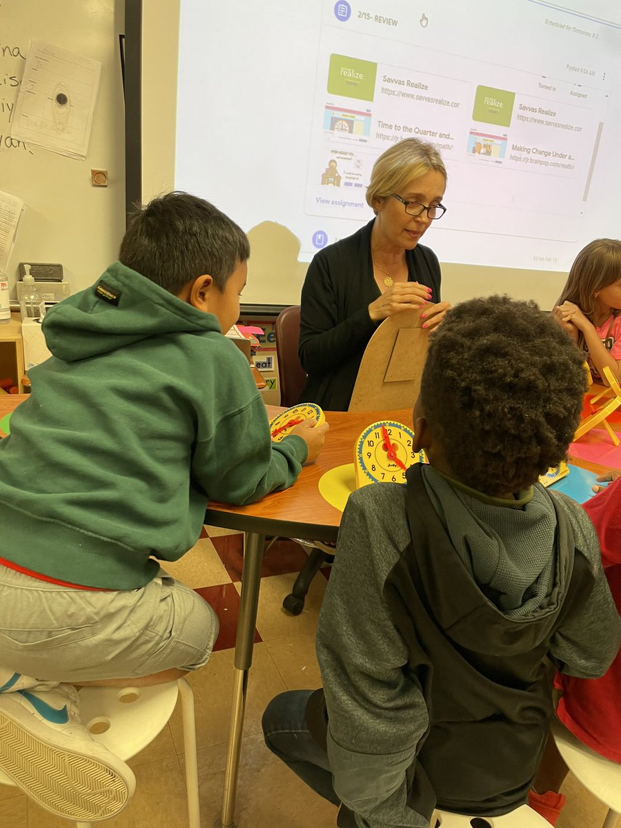 HagenRoad's tweet image. Help this teacher!! She forgot how to tell time!  #2nd grade students work together to tutor their teacher on skip counting by 5s, minute hand and hour hand demonstrations and even 15 minute quarters. #hagenrocks #smallgroup @SoftballMommy11
