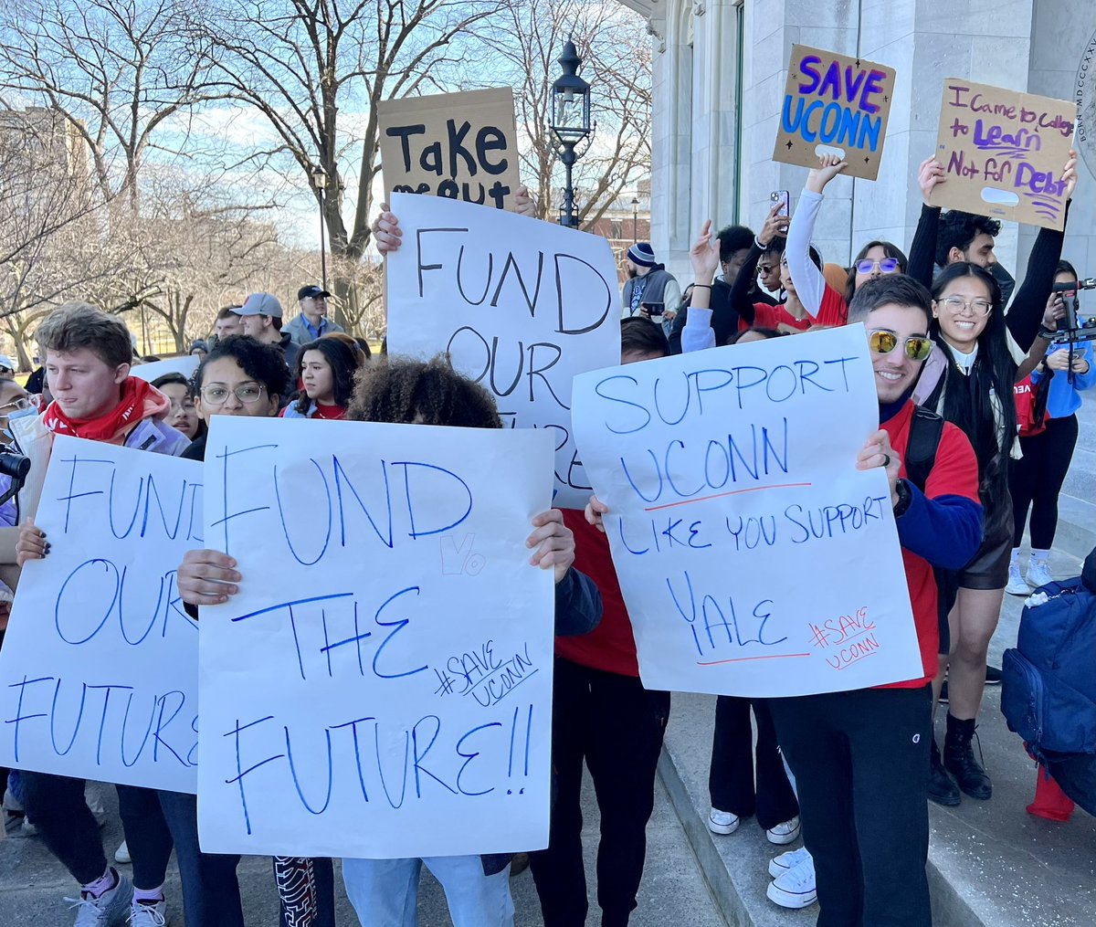 AFTCT's tweet photo. Happening now: @UCPEA3695, #UniversityHealthProfessionals, @UConnAAUP @UCHCAAUP members join @UConn, @UConnHealth students for rally to demand action to #SaveUConn &amp; #FundOurFutureCT. #HigherEdNotDebt @AFTUnion @AFTHigherEd @AFT_PE @AFTHealthcare  @AAUP @SEBAC_CT @usguconn https://t.co/0dThBgyOJK