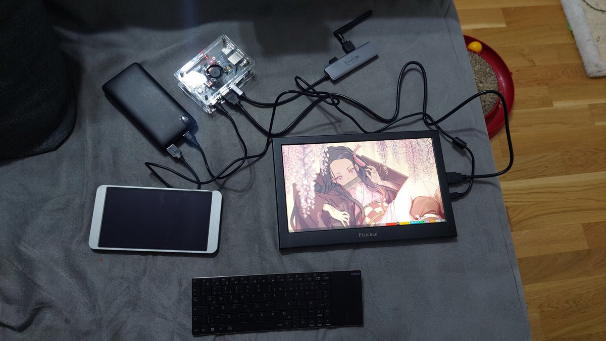 tiagoapimenta's tweet photo. OrangePi 5 running Alpine + LabWC powered by a power bank to make it portable https://t.co/0u9eaPhpsy