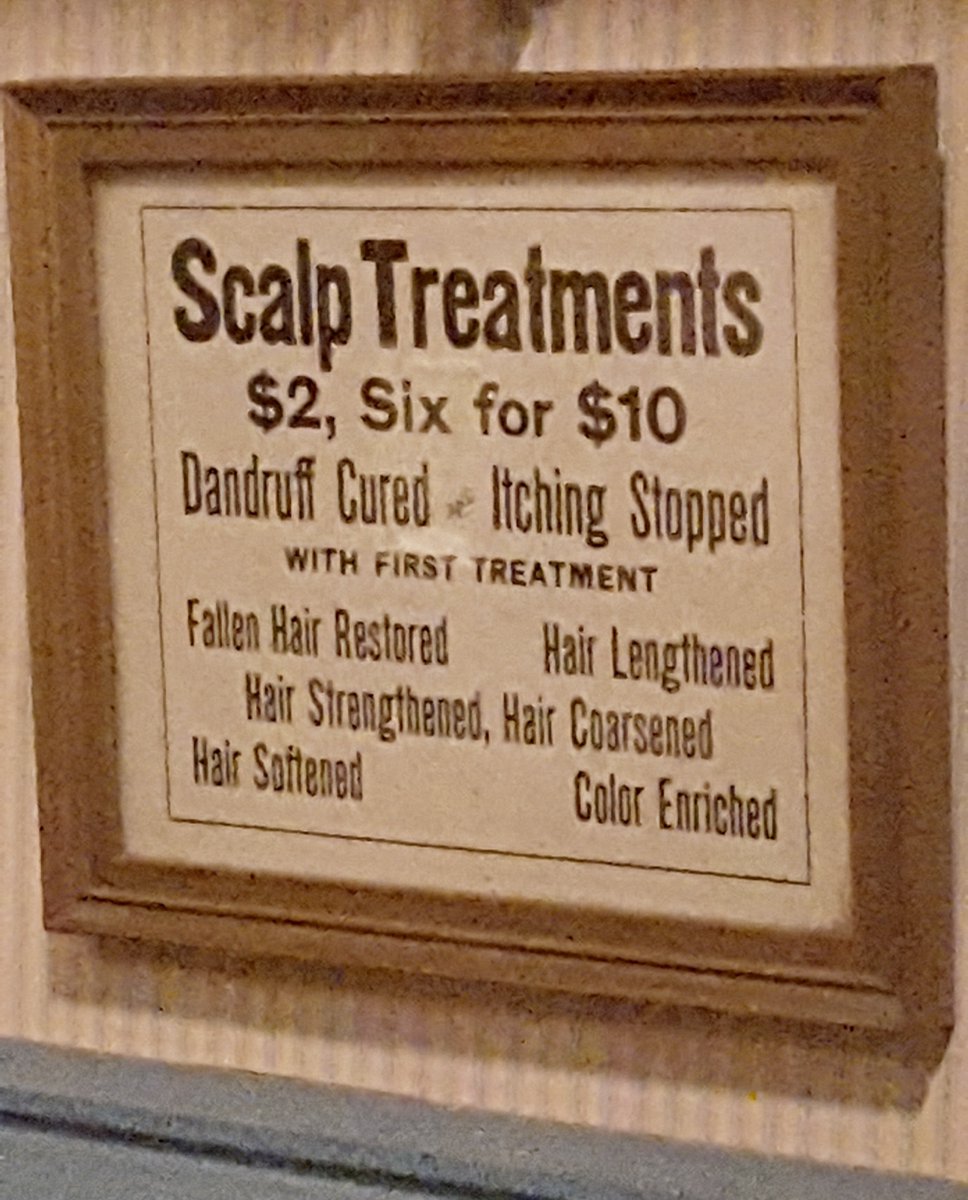 MPMgranny's tweet photo. I strolled past the #barbershop in the #mpmstreets noticed this advertisement. I'm glad I don't have a problem with my scalp. Those treatments sound quite rigorous! #history #beauty #mke #milwaukee https://t.co/SebcysUjvb