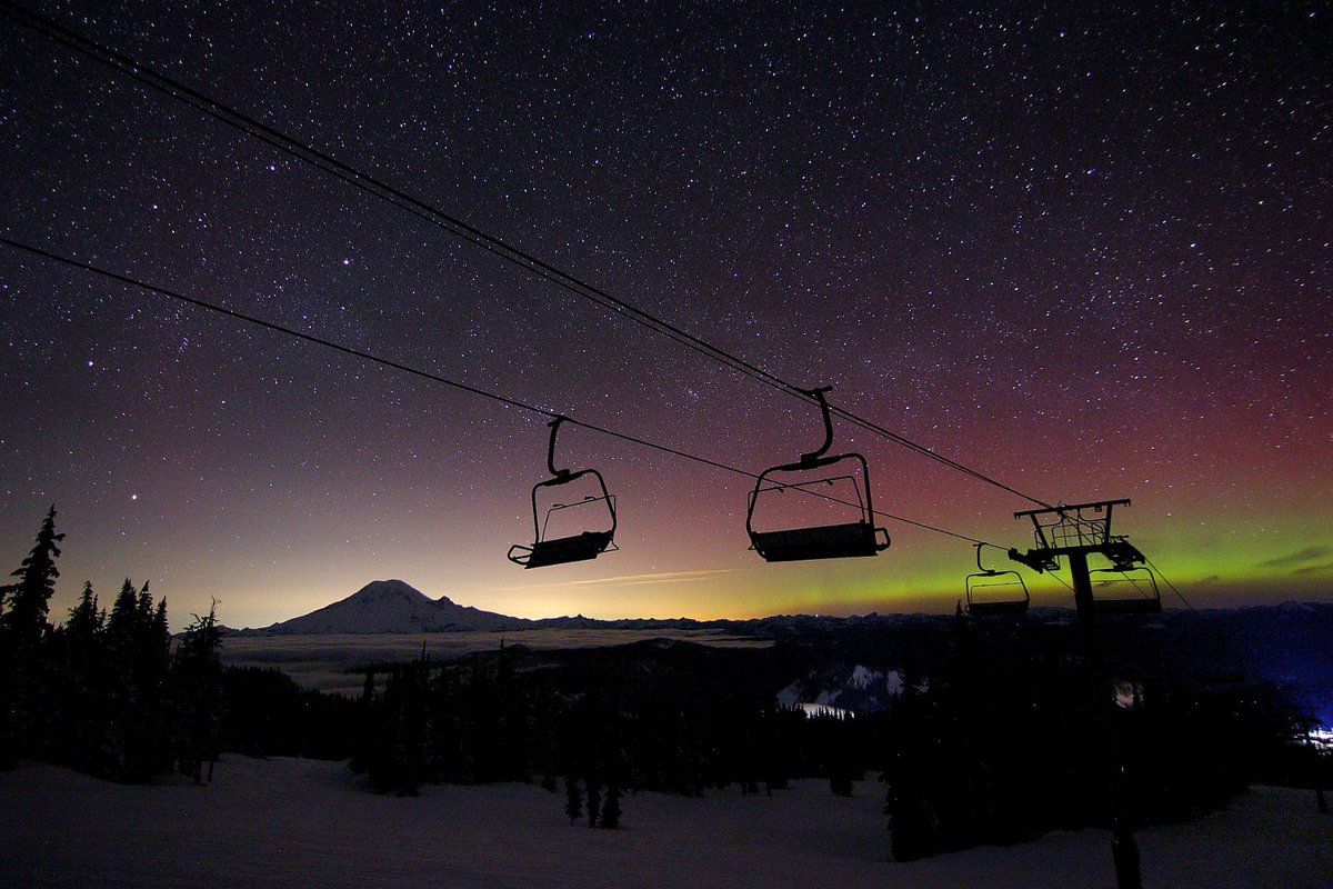 Northern lights putting on a show this morning! @BobVanDillen can’t resist still sending our best shots. Photo: Justin Tornow #mtrainier #northernlights