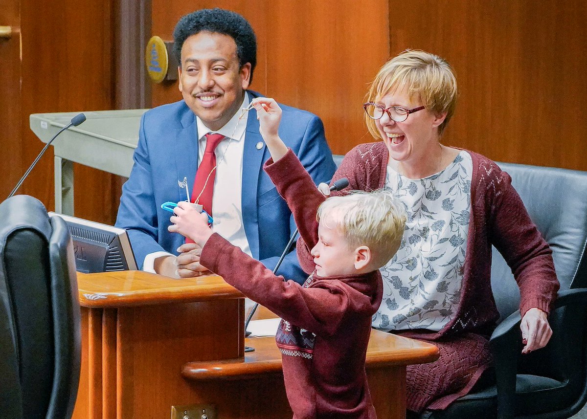 Rep. @JoshHeintzeman’s 6-year-old son, Troy, testifies before the #mnhouse Legacy Finance Committee with @MNChildMuseum President Dianne Krizan in support of a bill to provide museum funding. Rep. @samakabforhouse, left, is the bill sponsor. 📸 Andrew VonBank #mnleg