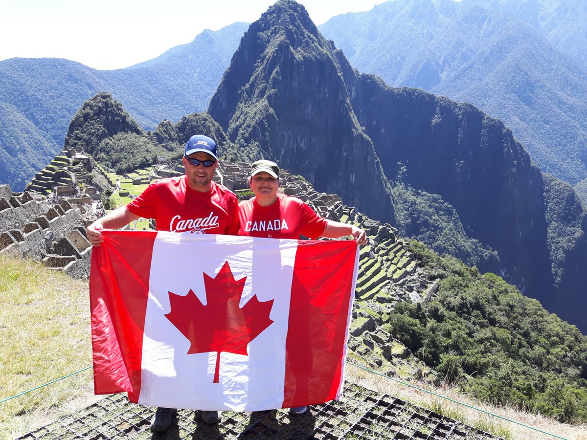 A great pic of Jen and I representing <a href="/SoftballCanada/">Softball Canada</a> in 2019 in Peru at Machu Picchu for our National Flag Day today.