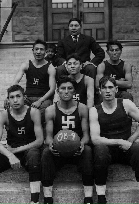Chilocco Indian School Basketball team, 1908. To some Indigenous communities, the swastika was a symbol of peace, love and good luck. Before it was appropriated by Nazi’s, white supremacists — and far right radical extremists.