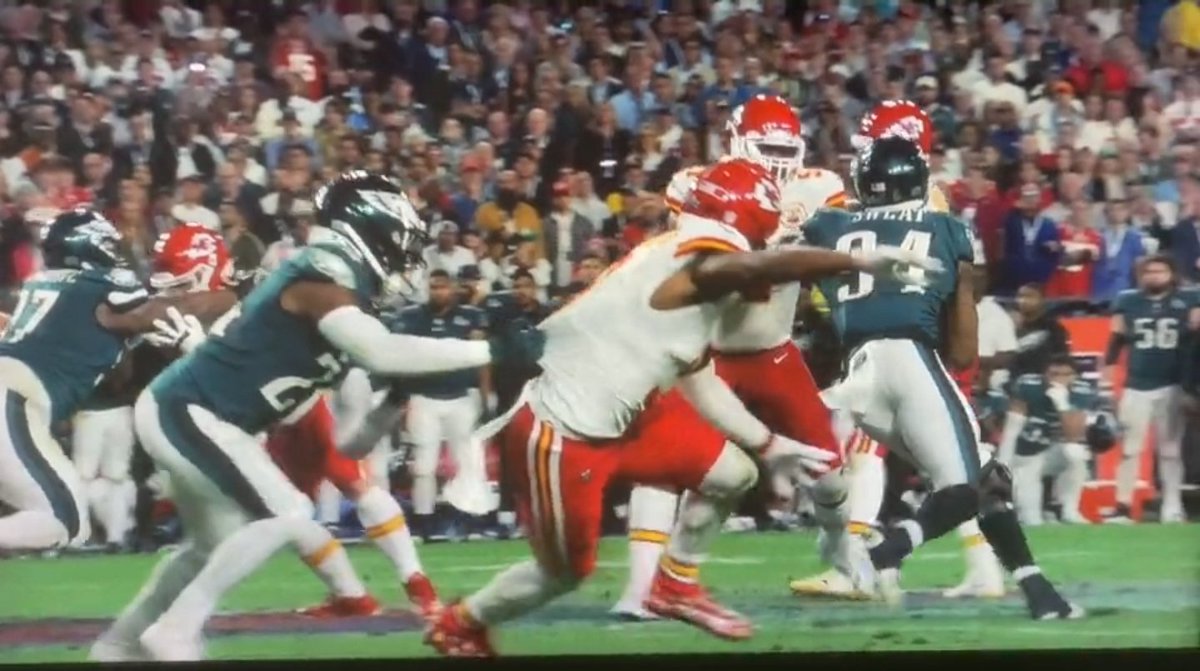 Gcarmi21's tweet photo. NFL Films has an excellent angle of James Bradberry's hold of JuJu Smith-Schuster. 

I think this image should dispell any illusion that it was a B.S. call.

#SuperBowl https://t.co/xoQRxm5J4V