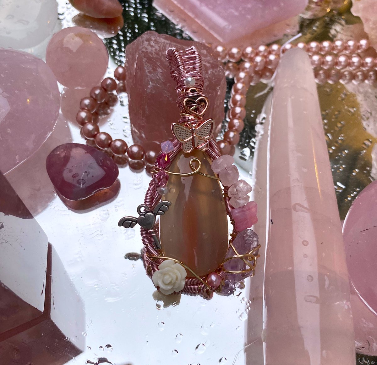 sunflower_c8e's tweet photo. i have been wearing this pendent of mine that never sold last year and i have been getting so many compliments on it. i have forgotten how much my art makes me connections. i miss creating so much. i think i’m gonna make some new pendants soon. 🥺 https://t.co/weFLfxigfR