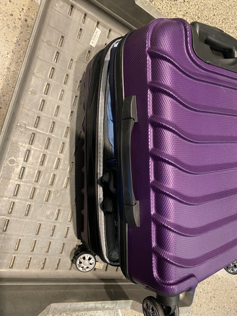 C_Shaffe's tweet photo. @AmericanAir why was my suitcase completely unzipped? https://t.co/QUsvOSbKjD