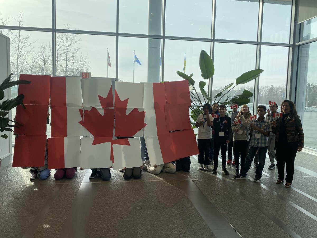 MrsAPereira's tweet photo. Today is flag day and @StJohnBoscoYEG 6C students had the honour of creating a living flag along side our @LtGovAB. Thank you for including us in this special celebration of our Canadian Flag🇨🇦 https://t.co/0ehPLw7a0l