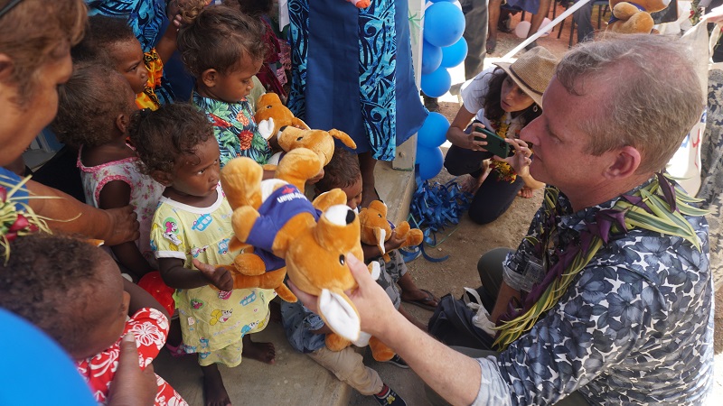 Australian Ambassador to Solomon Islands, Rod Hilton presents a teddy bear to one of the kids during the opening of SOLTUNA Pikinini Kea Hau. #fundedbyaustraliathroughstrongimbisnis