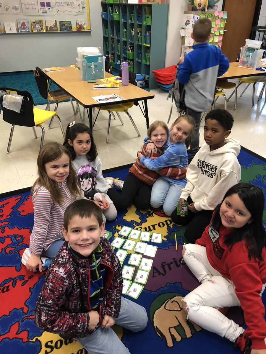 Having a great time practicing counting money!!!