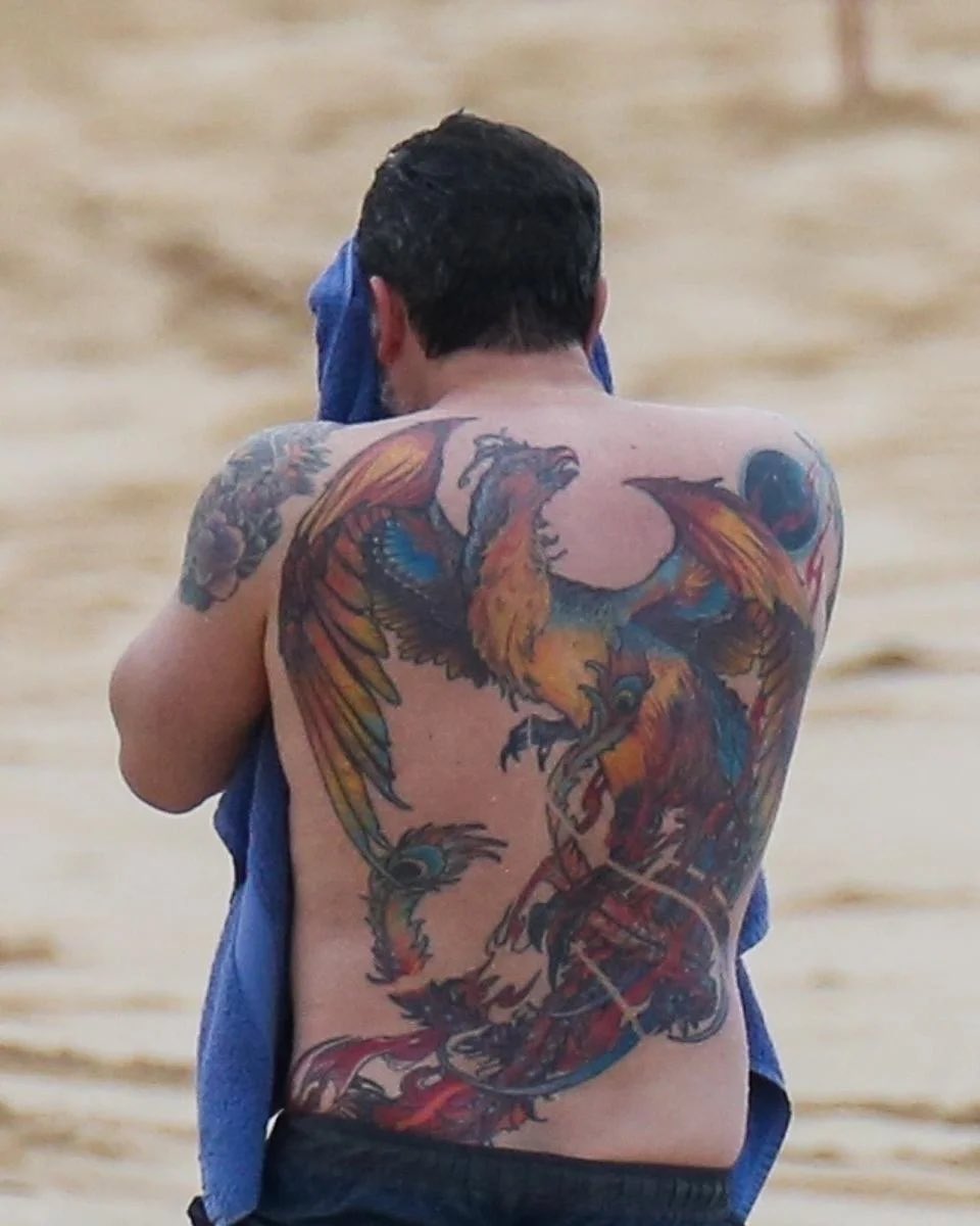 AlopezComedy's tweet photo. Confused why we’re discussing JLo and Ben getting matching V-day tattoos when this is what Ben’s back looks like https://t.co/xuPqZgNvUa