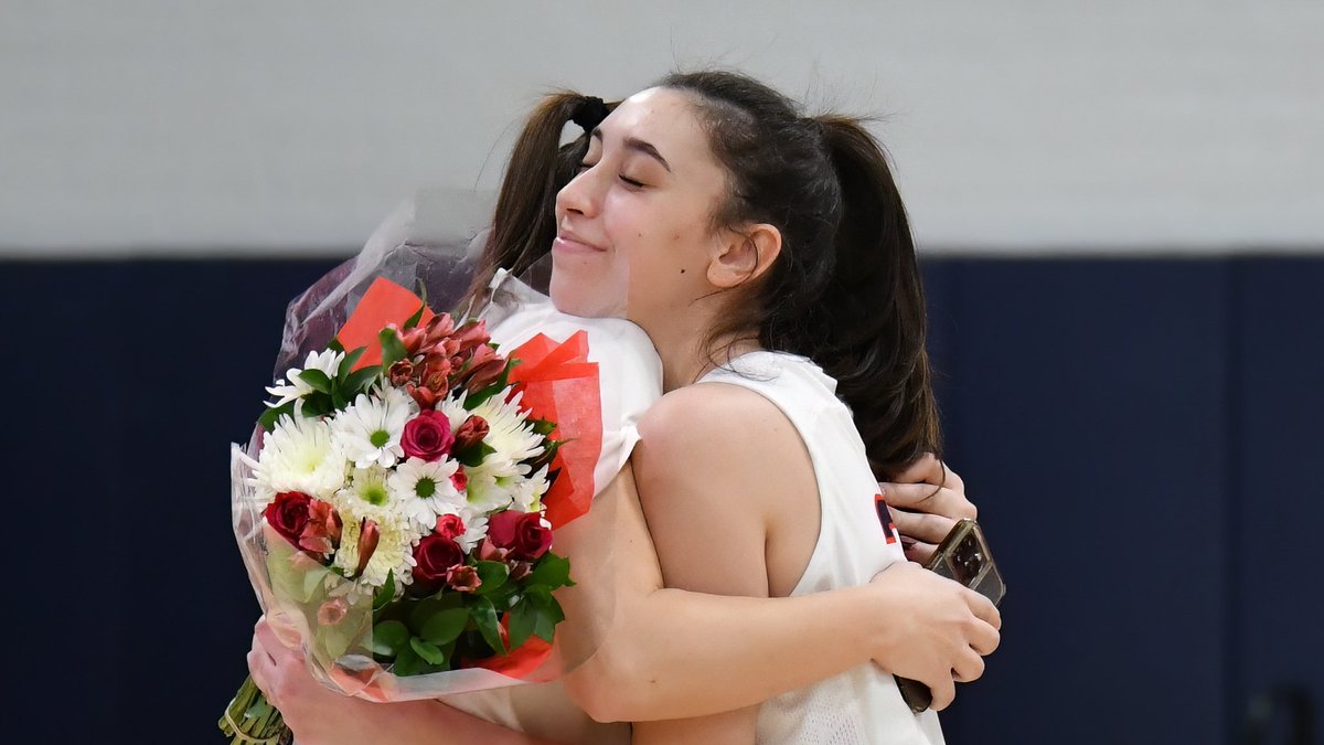 💙🧡 Yes, athletics is about competition. But it's also about friendship &amp; celebration. 💙🧡 Remember to cherish the special bonds we develop on our teams - between athletes, coaches &amp; families. 💙🧡 Here is girls varsity basketball standout senior Emma Rose! 💙🧡 
📷 Dave Taber