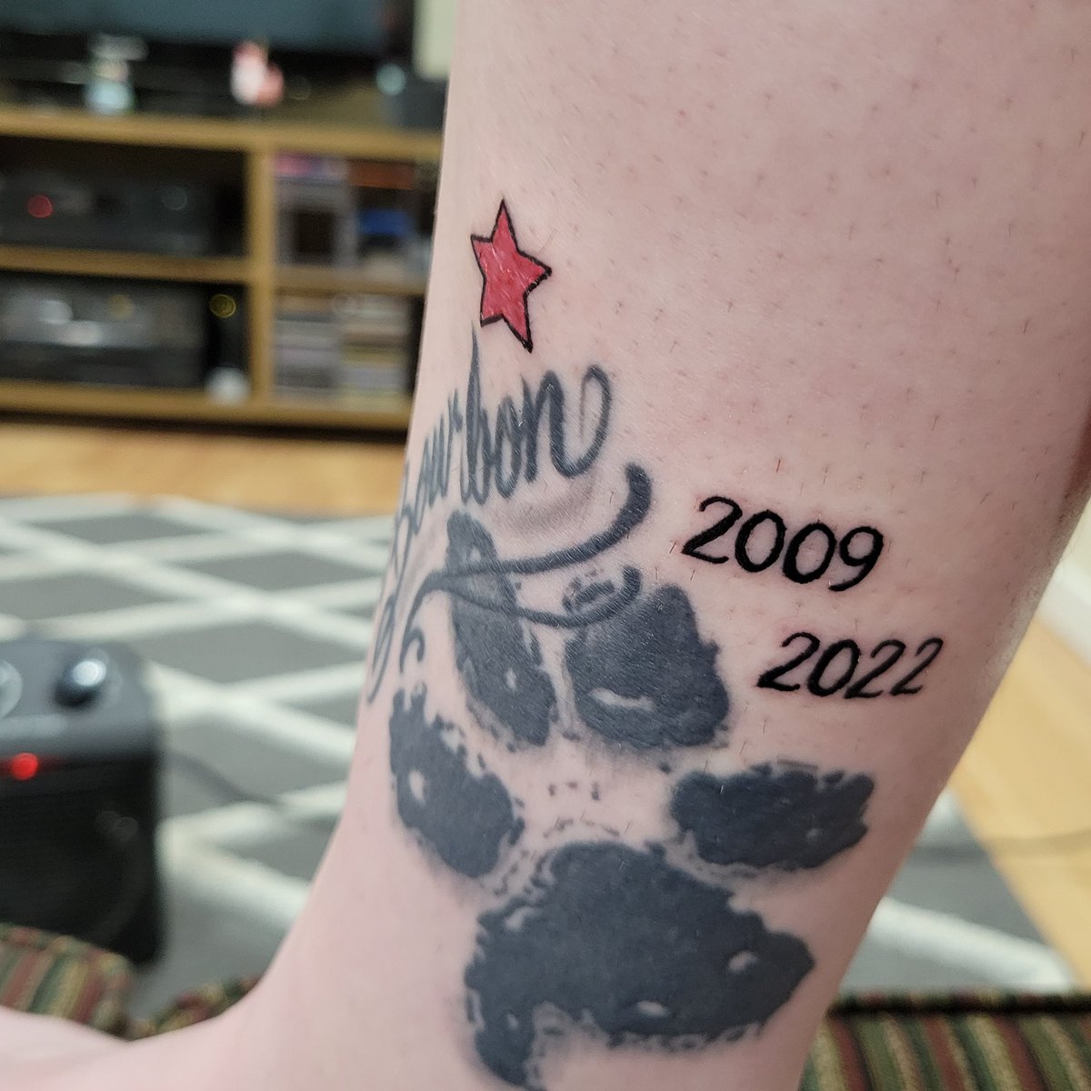 tipt0edragons's tweet photo. Not sure if this counts as another one, but added my soul dog's years to his paw print tattoo today. Also got a pink star for my other pupper Sam as his birthstone is October aka pink tourmaline. 💕 https://t.co/Xp88sJNLrS