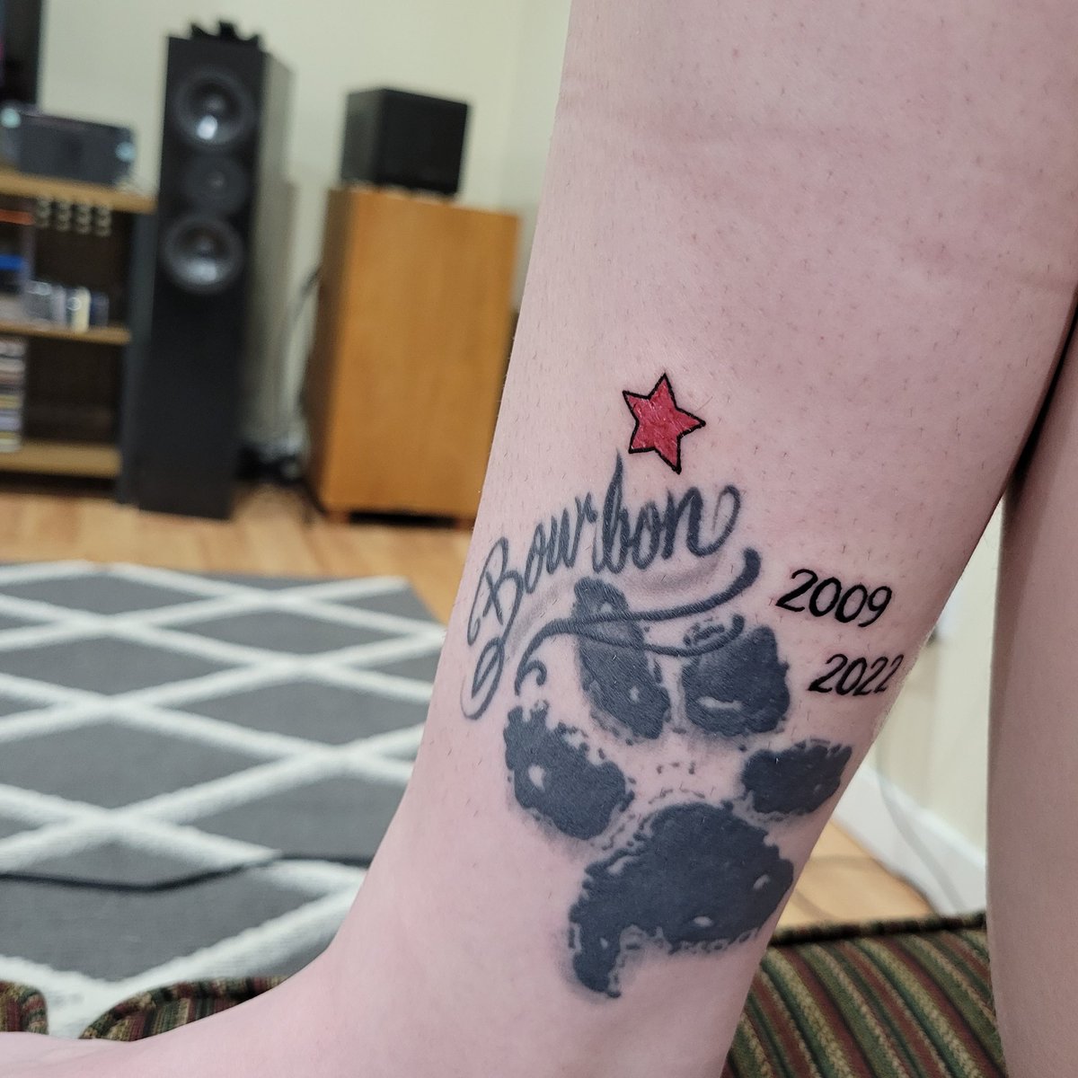 tipt0edragons's tweet photo. Not sure if this counts as another one, but added my soul dog's years to his paw print tattoo today. Also got a pink star for my other pupper Sam as his birthstone is October aka pink tourmaline. 💕 https://t.co/Xp88sJNLrS