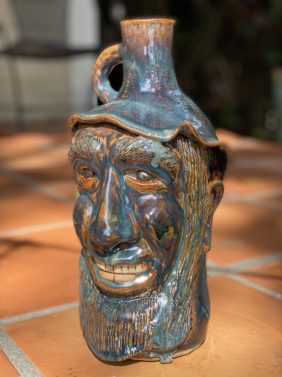 OldFLA's tweet photo. The kiln gods were kind. #facejug #ceramics https://t.co/S7BPYtt2KY