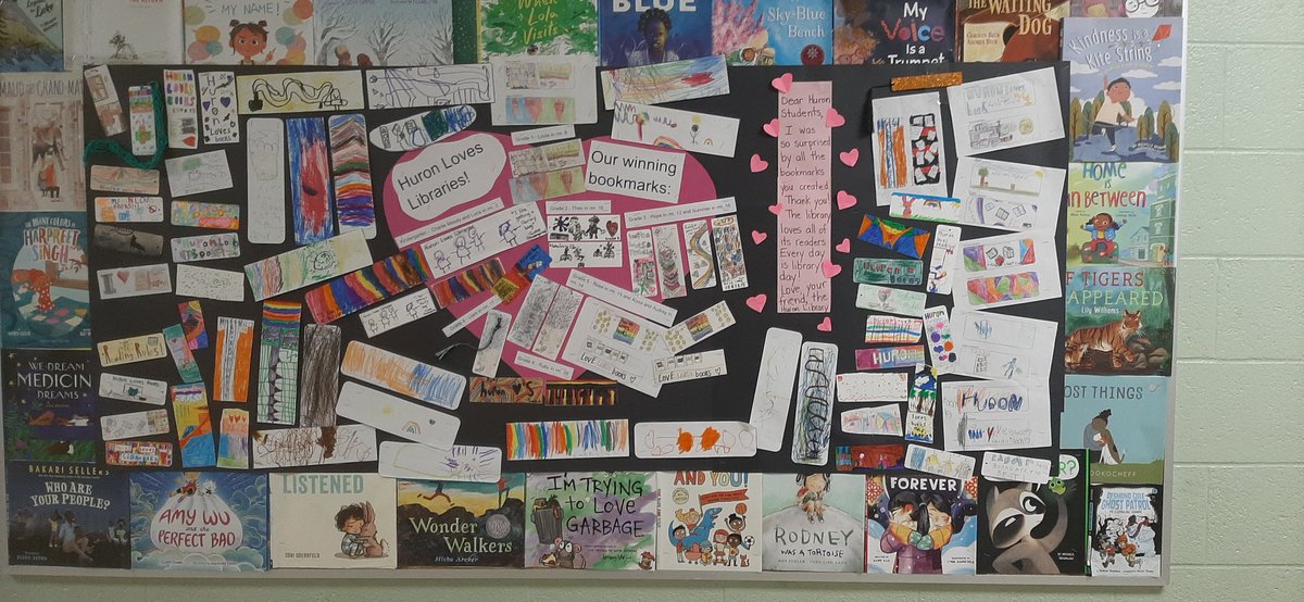 Grateful for inspiring TLs! Our 'Two copies? Read with a friend' corner nook comes from @wburchjones sharing, and our 'Huron loves Libraries' bookmark display started with @aprildemelo connecting me with @MsKondo_TL for contest/bookmark production advice. #SchoolLibraryJoy