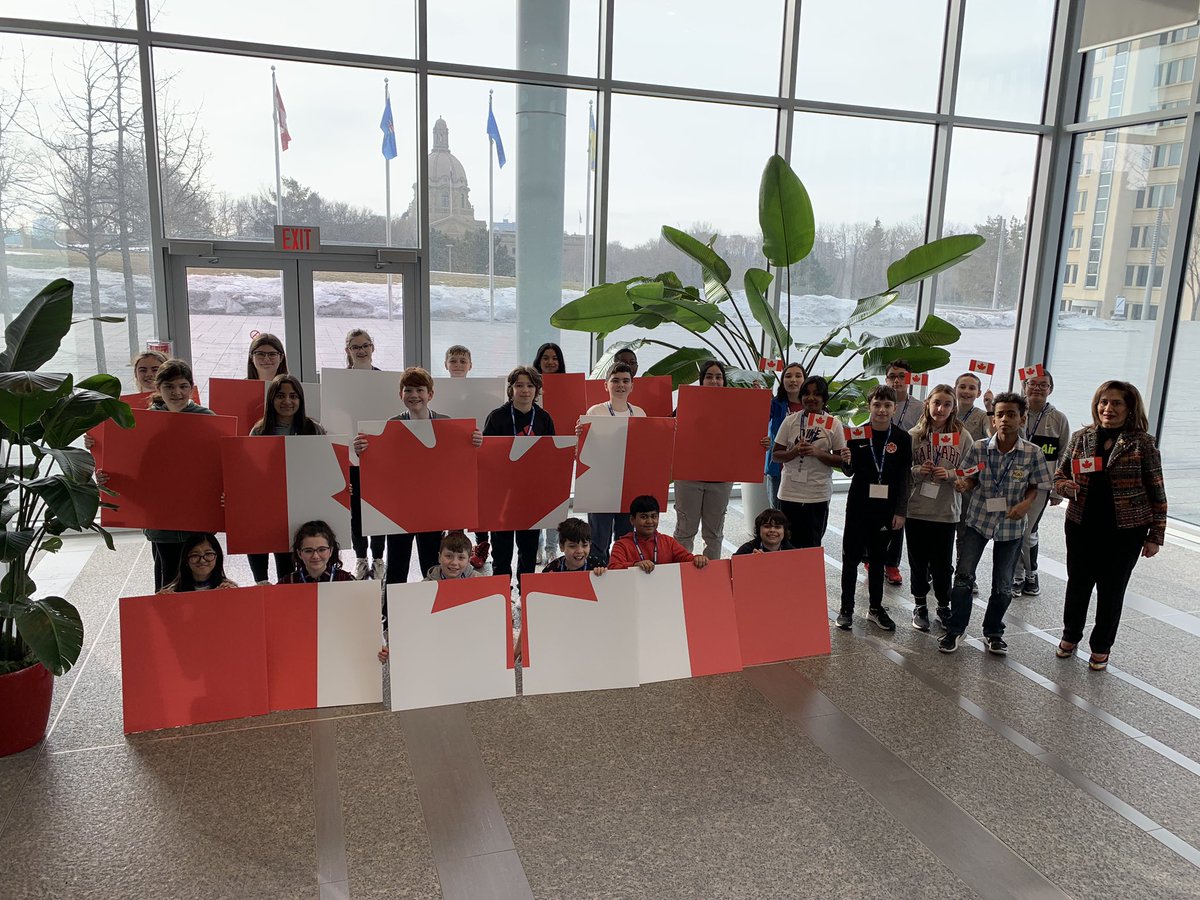 LtGovAB's tweet photo. After their visit, Her Honour joined the rest of the wonderful Gr. 6 class from St. John Bosco School in Edmonton while they created a living flag to celebrate the 58th birthday of Canada’s beloved maple leaf! #Canadianflag @StJohnBoscoYEG #SATL https://t.co/OdbhW7m28V