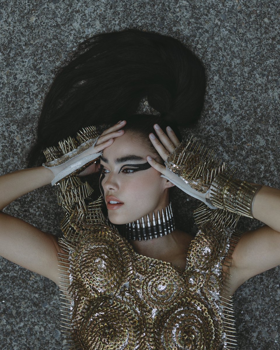 Made a dress out of nails